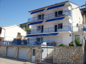 Apartments with a parking space Senj - 16365